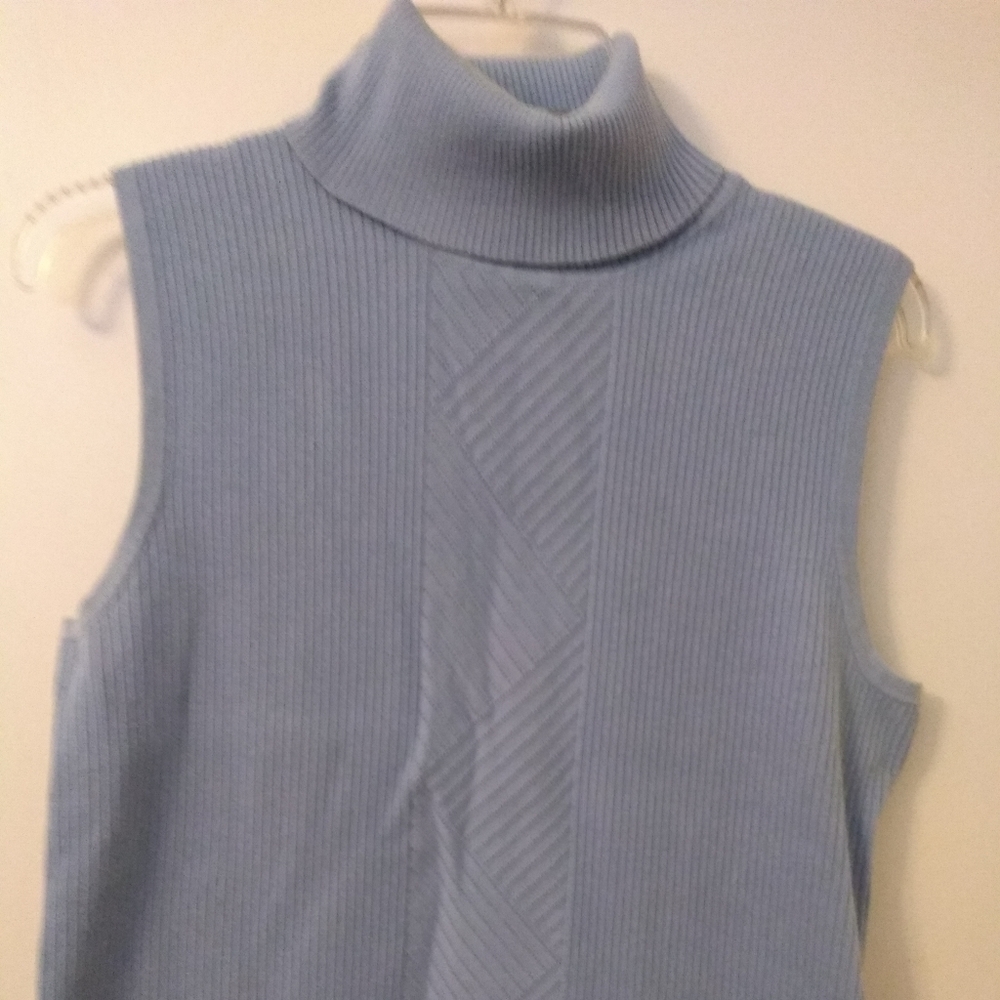 Blue sleeveless turtleneck sweater